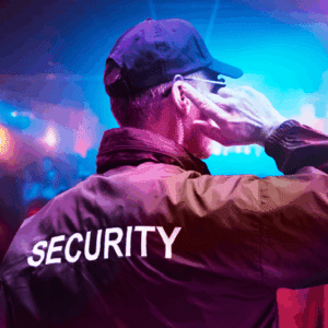 Licensed security guard using a radio at an event in Seattle CBD